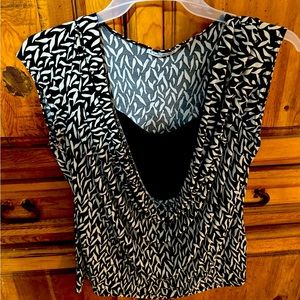 Loved this blouse. No longer fits. So comfortable and light.